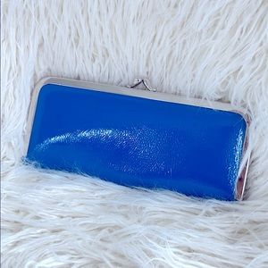 Bright blue patent wallet clutch